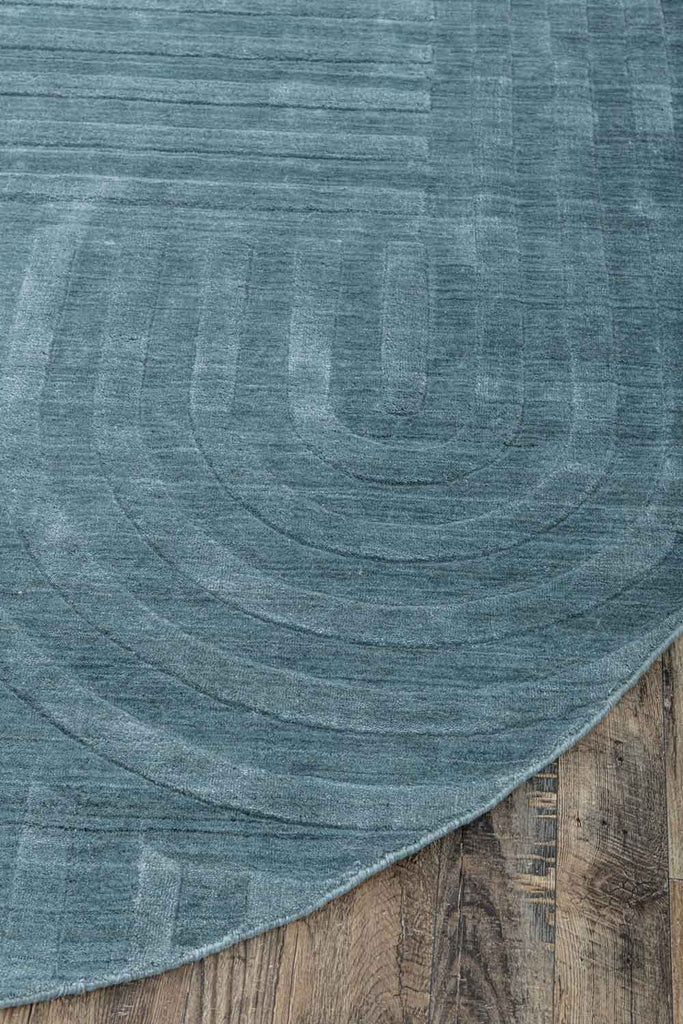 Curve Oval Dark Blue Wool And Bamboo Silk Handloom Carpet