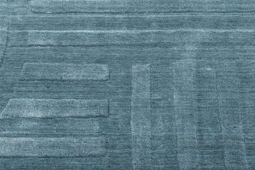Curve Oval Dark Blue Wool And Bamboo Silk Handloom Carpet