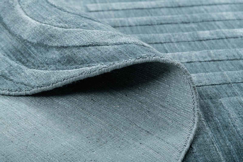 Curve Oval Dark Blue Wool And Bamboo Silk Handloom Carpet