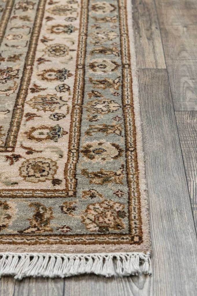 Luxury - Pristine Sea Blue Ivory Woolen Hand Knotted Premium Carpet